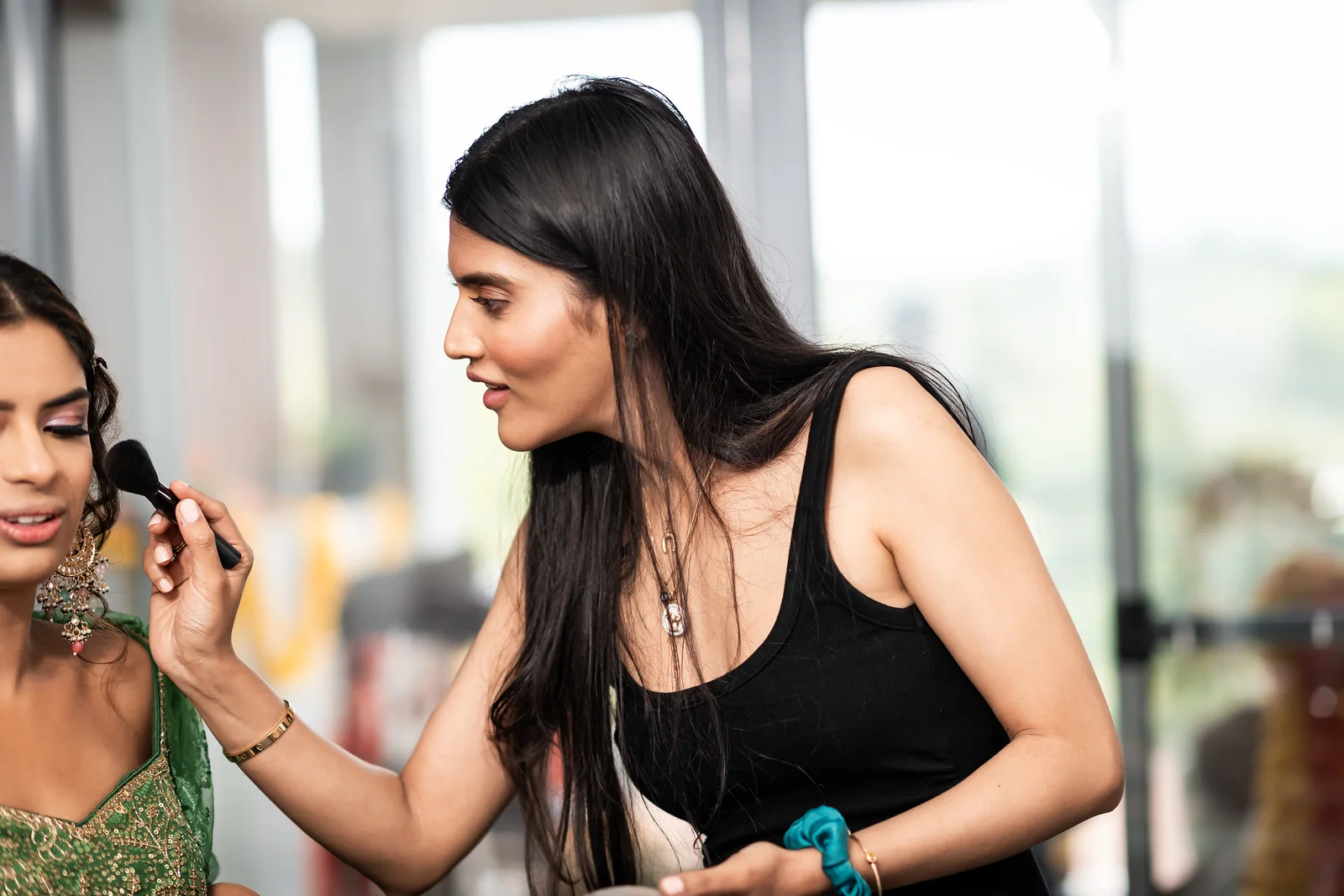 A member of Heera’s team refining makeup for one of Shiv’s loved ones at Jamberoo Lodge
