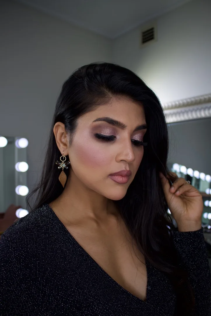 Heera exploring modern glamour, eye definition and a softly sculpted finish on herself